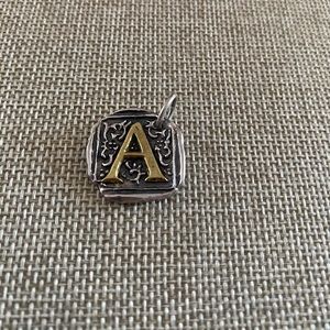Waxing Poetic “A” brass sterling silver charm